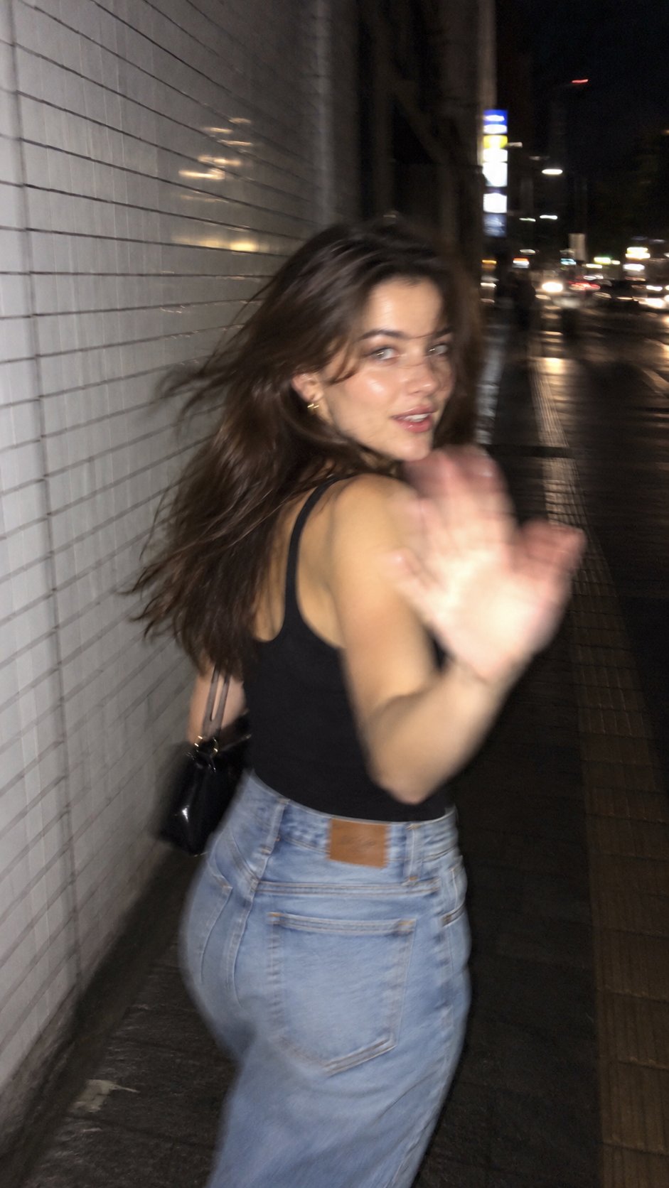 GPT Image 2.5 prompt for a late-night Tokyo street phone snapshot (image 1 of 2)