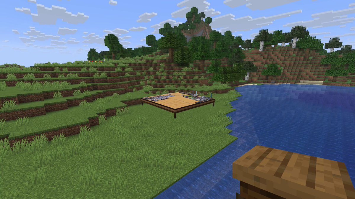 Opus 5.5 builds a playable city builder inside Minecraft