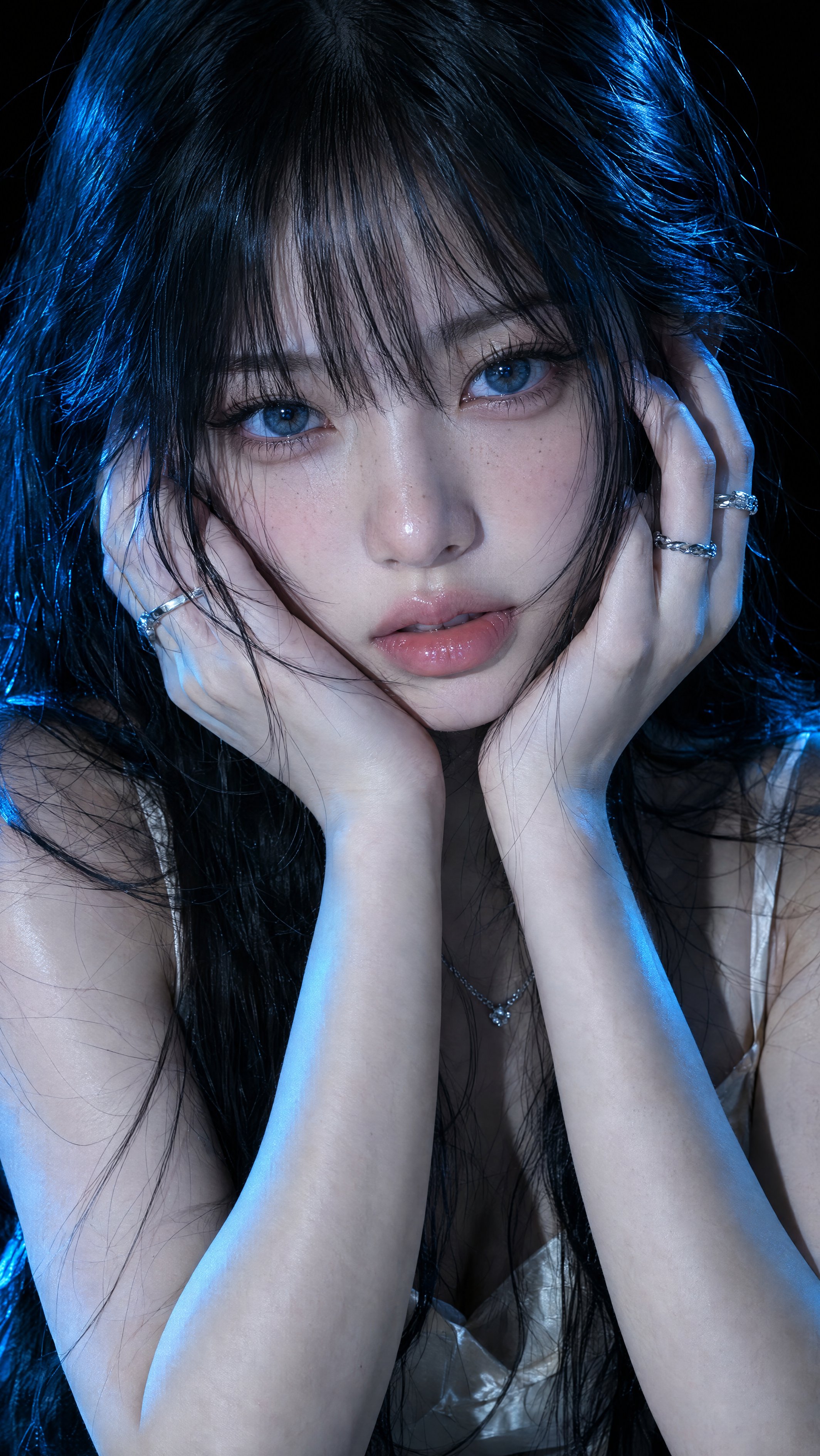 GPT Image 2.5 portrait prompt: cyan-blue lighting close-up